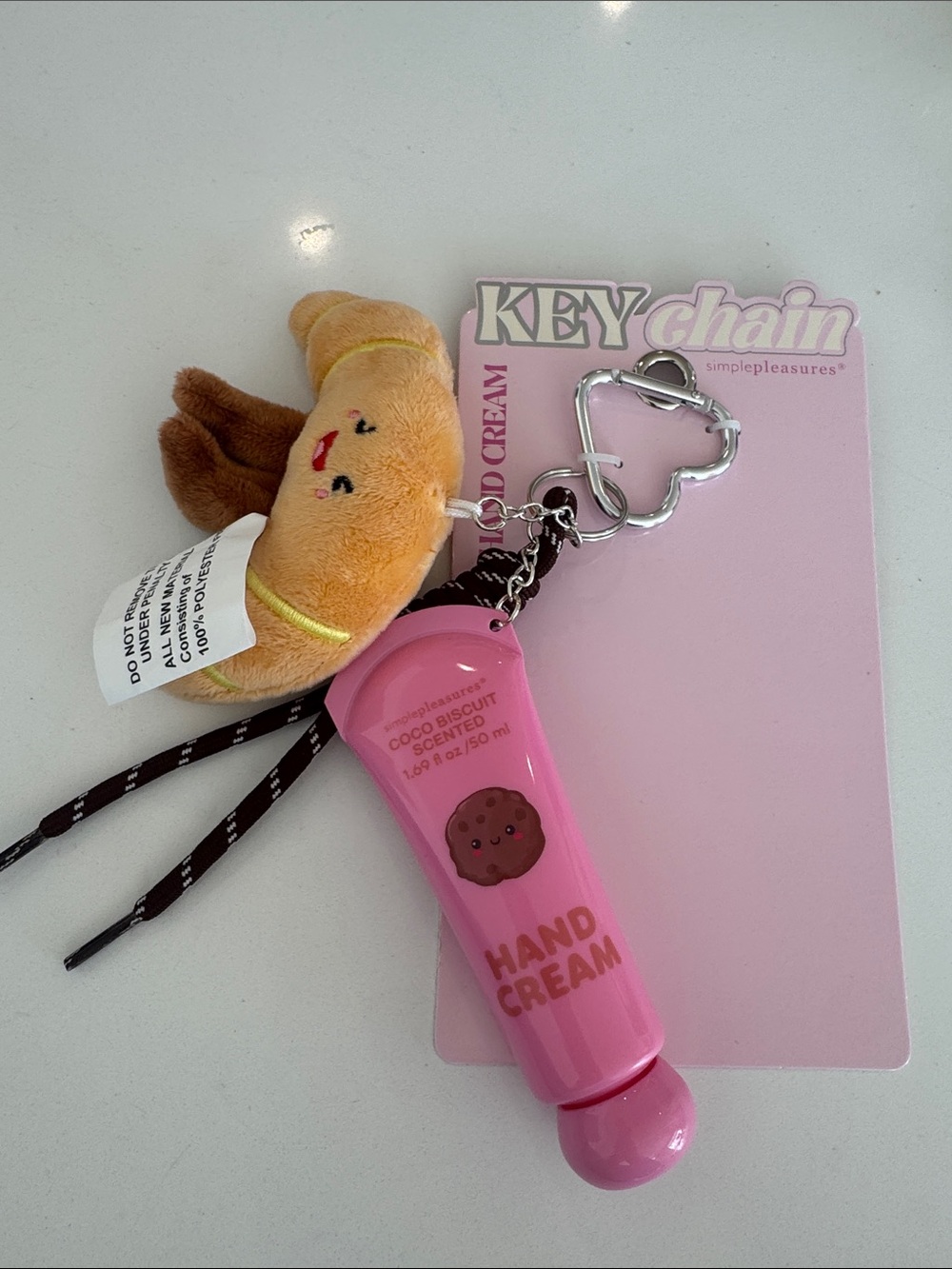 Simple Pleasures Pink Scented Hand Cream Keychain with Plush Croissant Charm